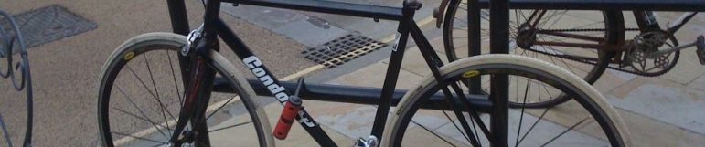 cropped-traditional-bicycle-parking-rails-floor-u-bike-rack_3-1.jpg